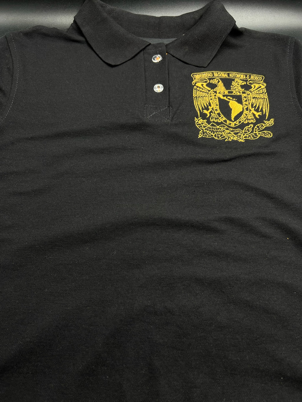 UNAM Polo NEGRA playera