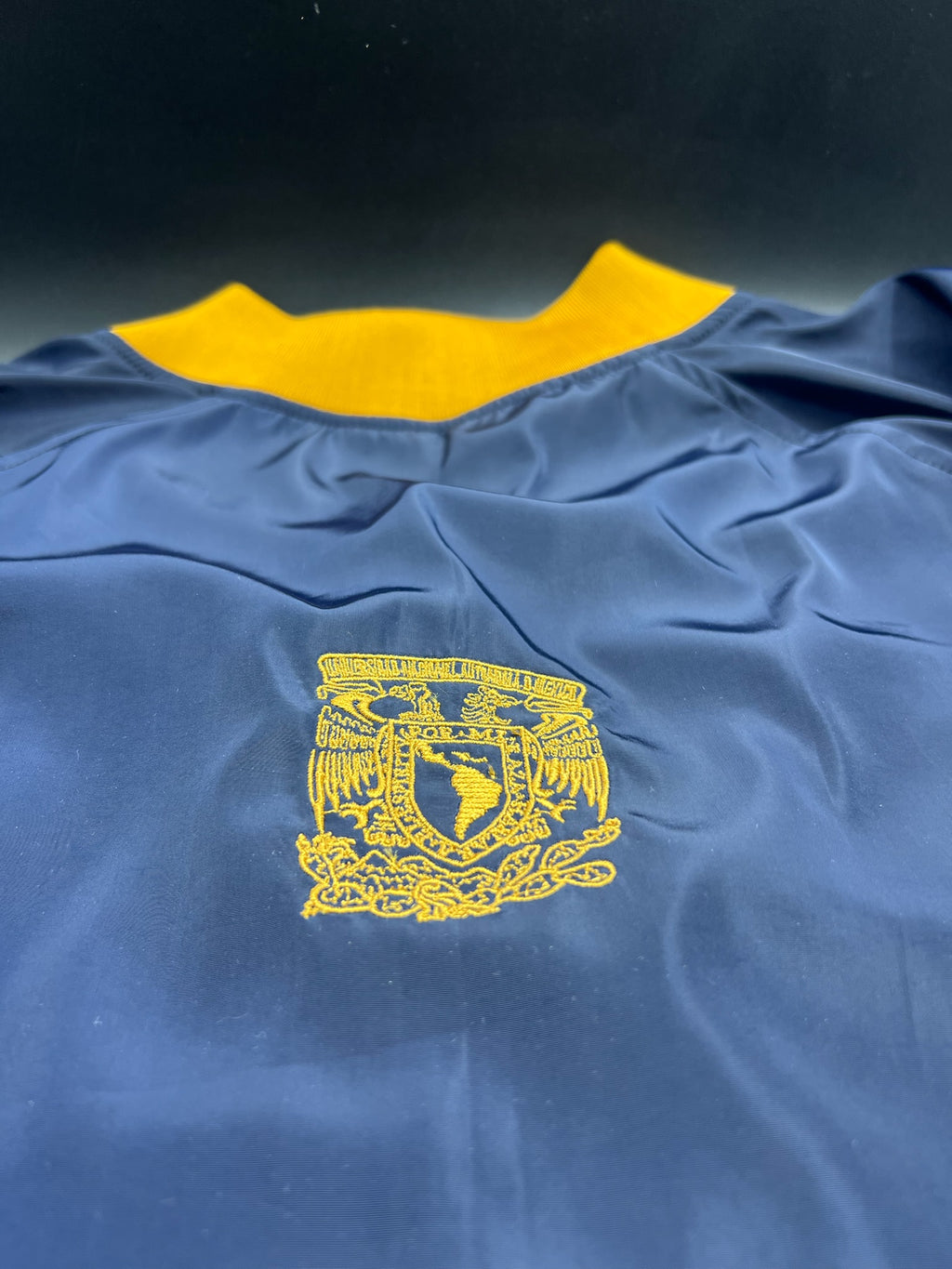 UNAM RAGLAN TIPO ROMPEVIENTOS